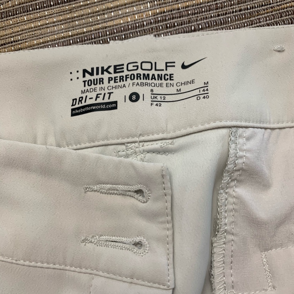 Nike golf shorts. Size 8 cream color